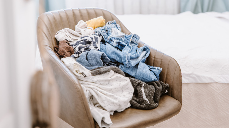 Pile of clothes in chair