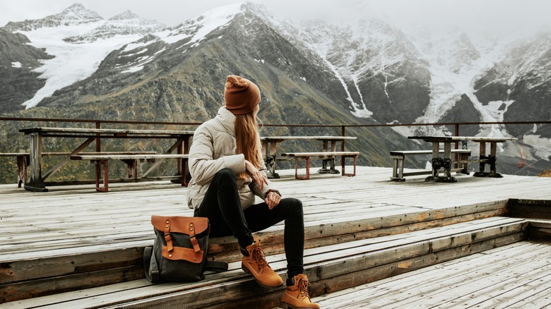 Woman with luggage in Switzerland
