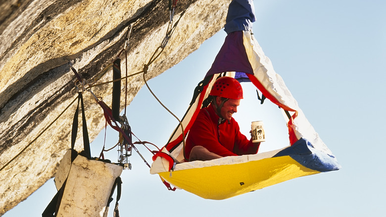 man cliff camping