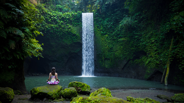 Yoga by a waterfall