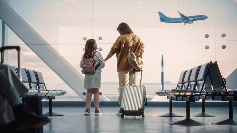 Woman and child in airport