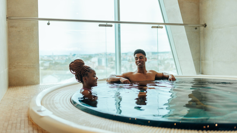 Two happy people in pool