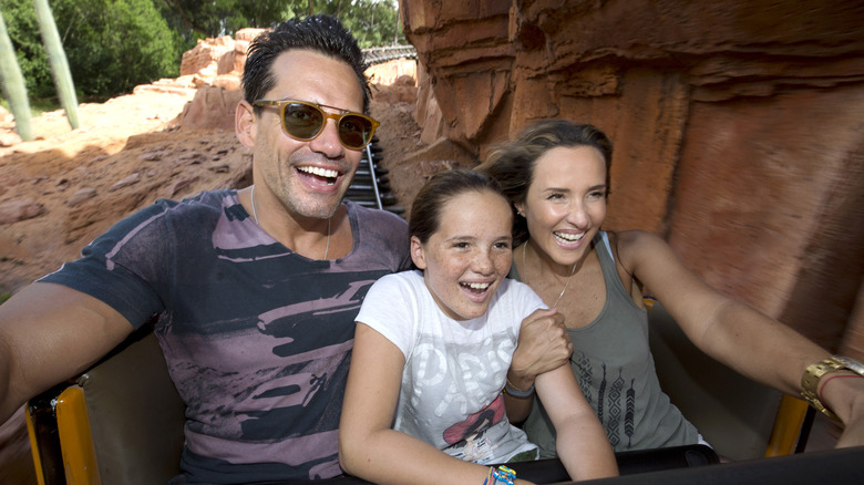 Family riding on Big Thunder Mountain Railroad