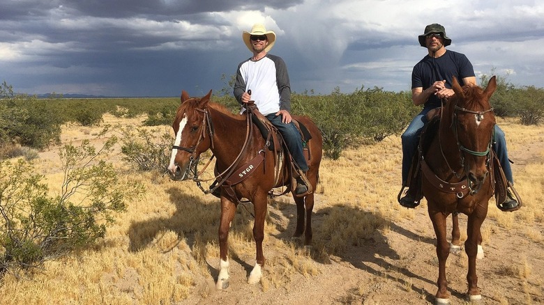 two men on horses at Stagecoach Trails Guest Ranch
