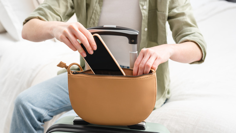 putting phone in a bag