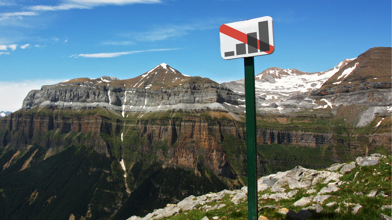 no cell service sign by mountains