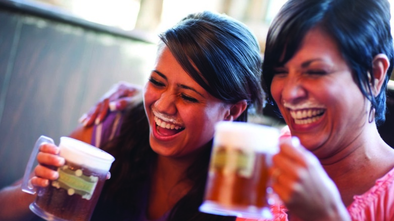 Women drinking Butterbeer
