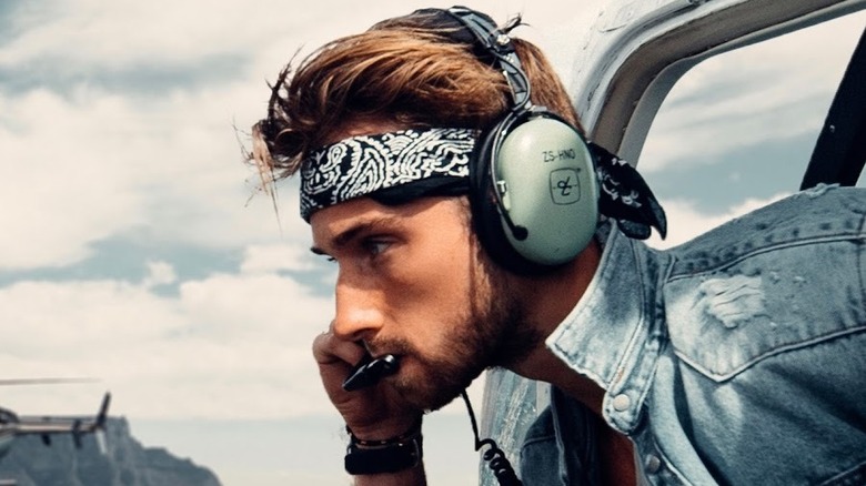 Sam in a helicopter