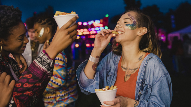 Friends at food festival