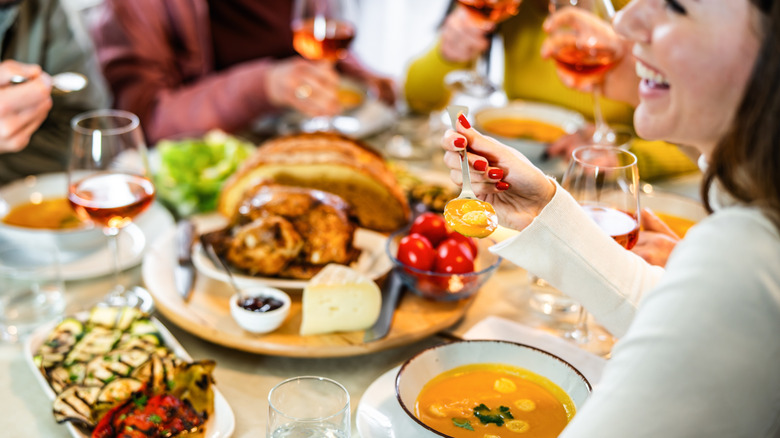 People having a meal with wine