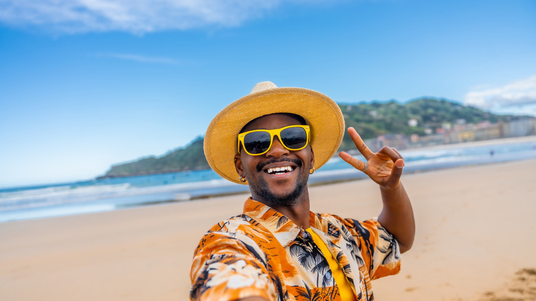 happy tourist on a beach