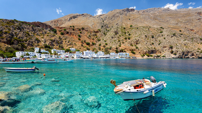 Boat floating in turquoise water