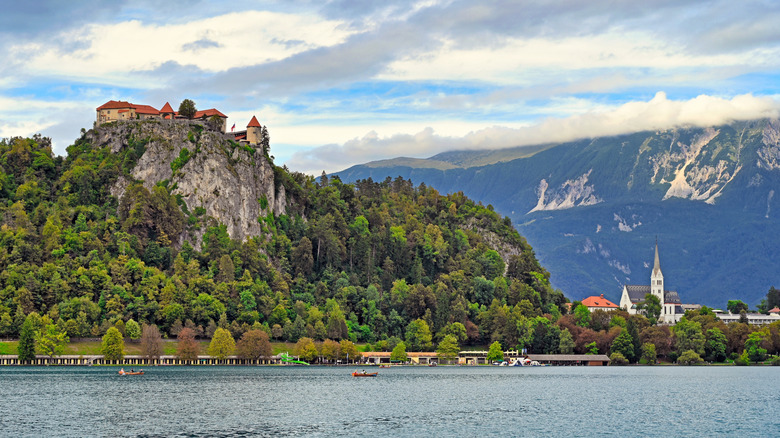 Bled Castle on top of a cliff overlooking Lake Bled