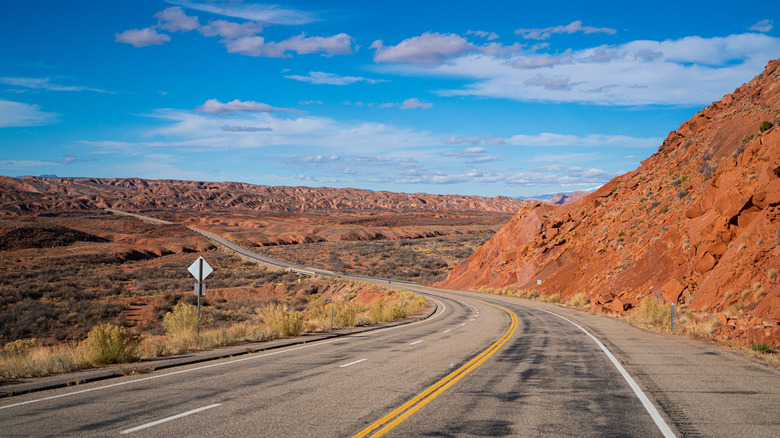 A long stretch of open road in the Arizona desert