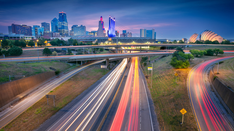 Kansas City, Missouri skyline a dawn with long exposure view of highways in the foreground