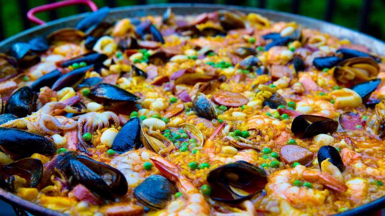 A large pan filled with paella.