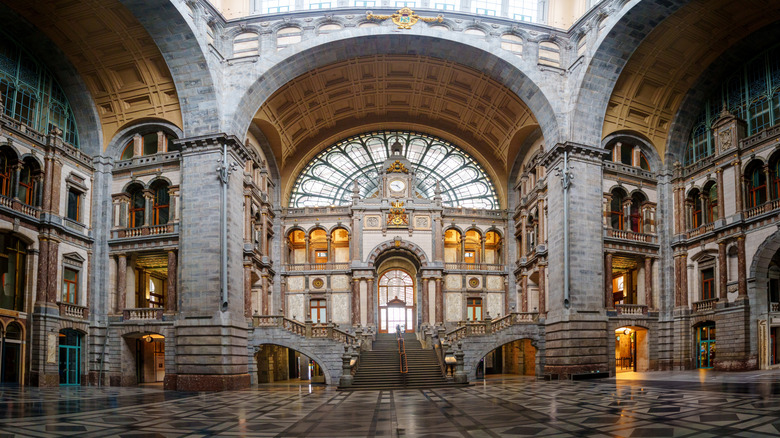the marble and stone interior of Antwerp Central Station in Belgium