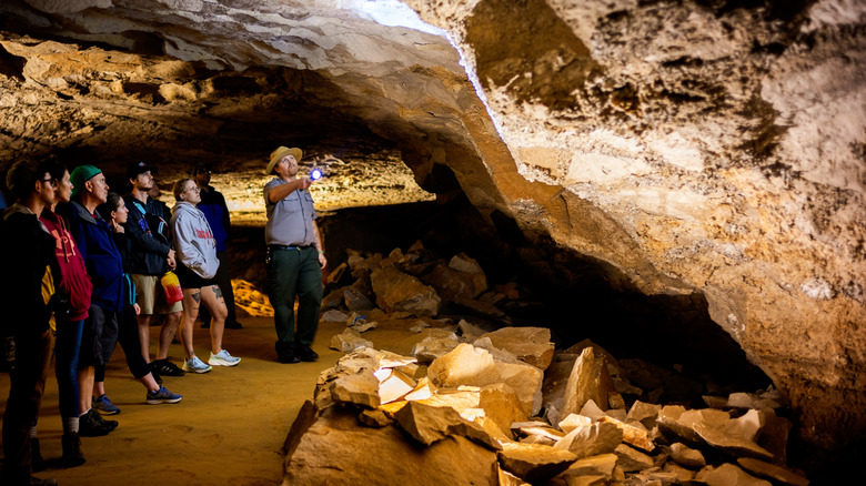 a park ranger leads a tour in the Mammoth Caves