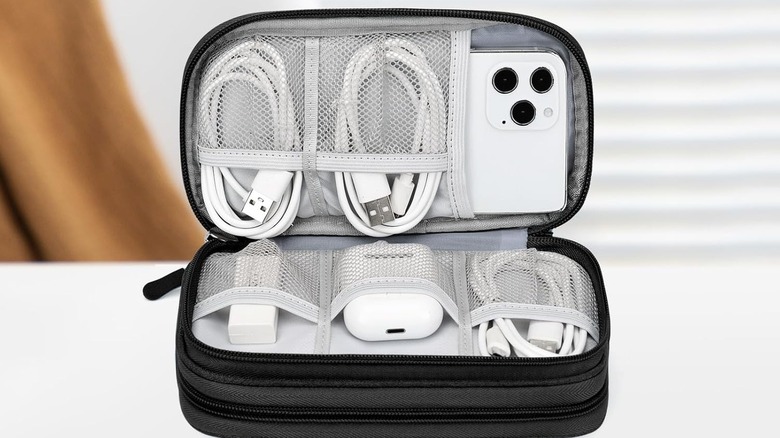 A cable organizer bag full of cables.