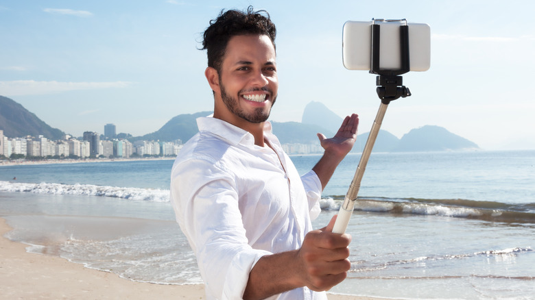 Man using selfie stick