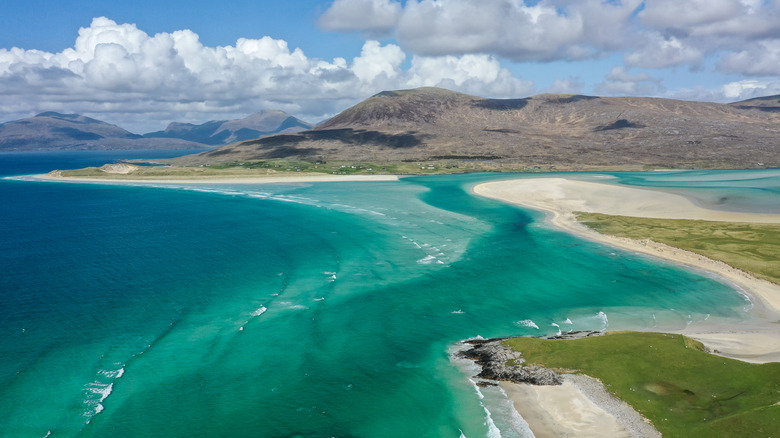 Aerial view of turquoise sea and white-gold sand on Luskentyre beach