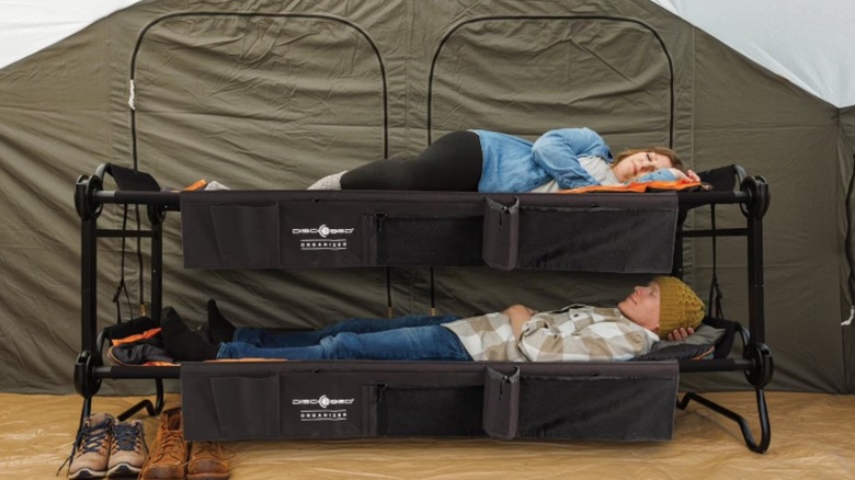 two people lying on the Sam's Club Large Disc-O-Bed Bunkable Cots
