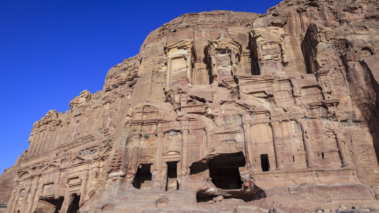 The Corinthian Tomb and Palace Tomb, rock-cut tombs in Petra, southern Jordan, featuring intricate Nabataean architectural details carved into sandstone cliffs