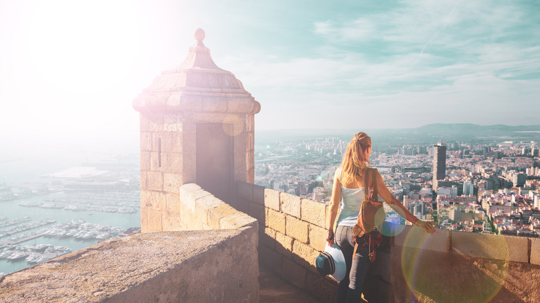 woman enjoying a panoramic view of the city