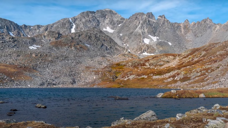 A glacial lake surrounded by jagged mountain peaks in Colorado.