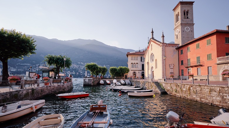 the old harbor and the waterfront promenade in Torno on Lake Como in Lombardy, Italy