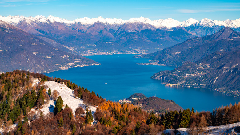 a panoramic view of Lake Como with the Alps in the background from Monte San Primo in Lombardy, Italy