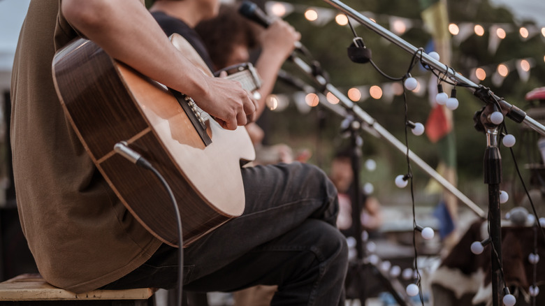 Close-up of musician playing a guitar