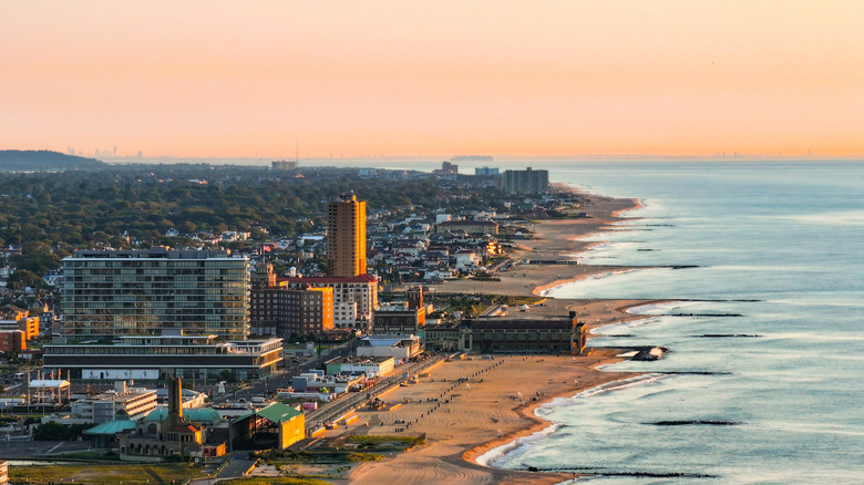 Aerial view of a beachside town at sunset