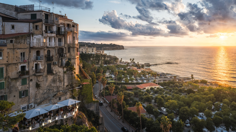 Houses in Tropea overlooking the sea at sunset
