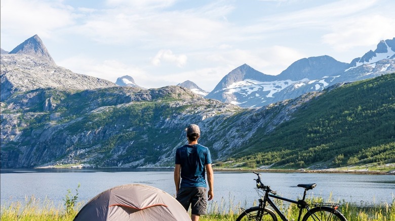 man camping near mountains