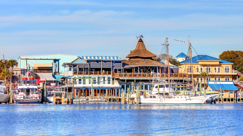 blue water, boats, waterfront buildings