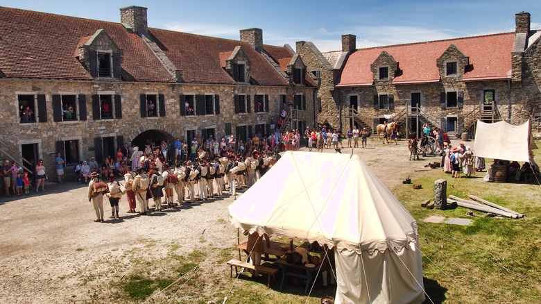 Re-enactors stand in formation at Fort Ticonderoga