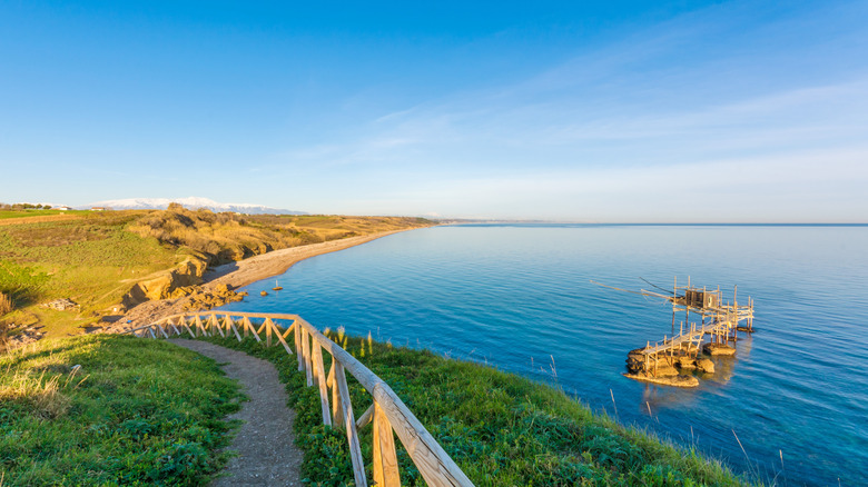 Coastal path on hill with ocean below