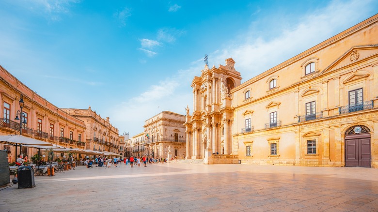 Golden cathederal and buildings on main square of Ortigia Island, Syracuse