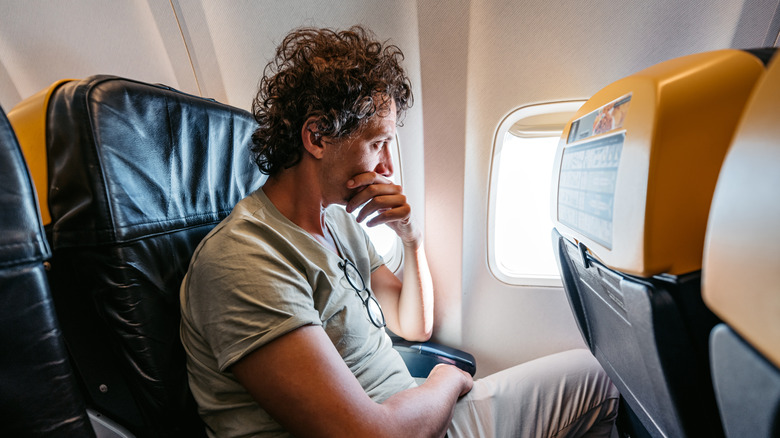 Man dealing with flight anxiety