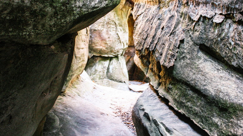 Narrow passageway between giant boulders in The Channels
