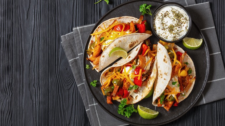 Classic Tex-Mex fajitas in a cast iron pan