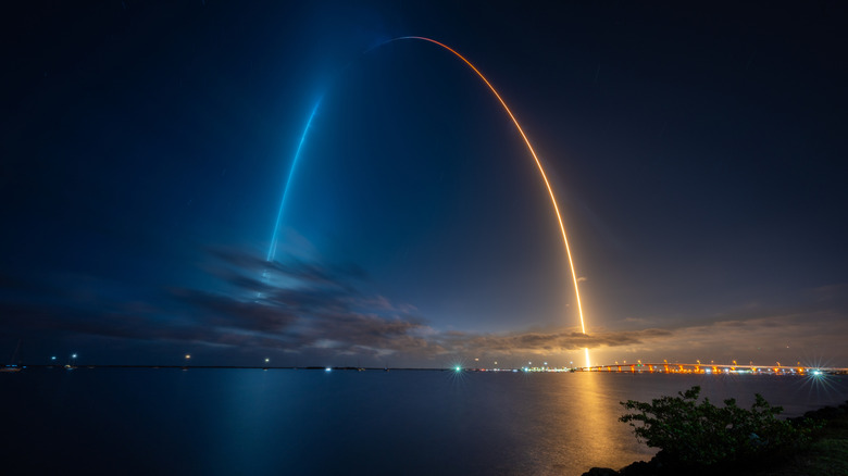 rocket launch over water