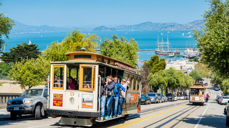 tourists on San Francisco cable car