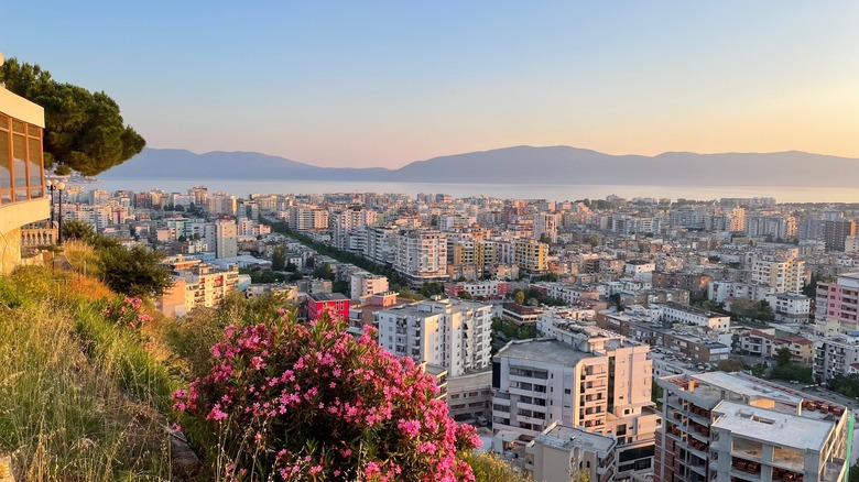 view of coastal city and distant mountains
