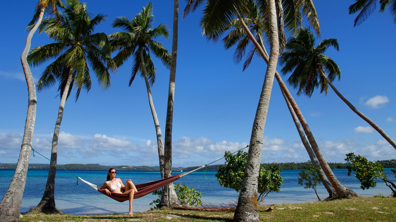 person in hammock on beach on Ofu Island