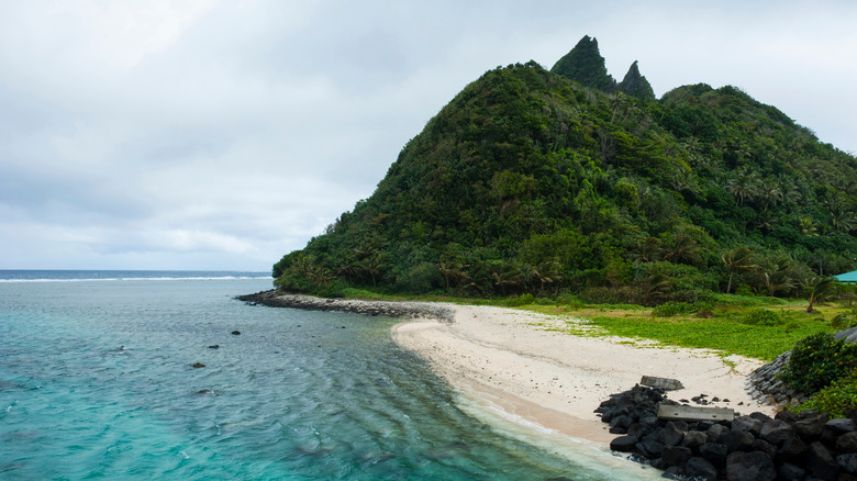 aerial shot of Ofu Island with mountains and beaches and ocean