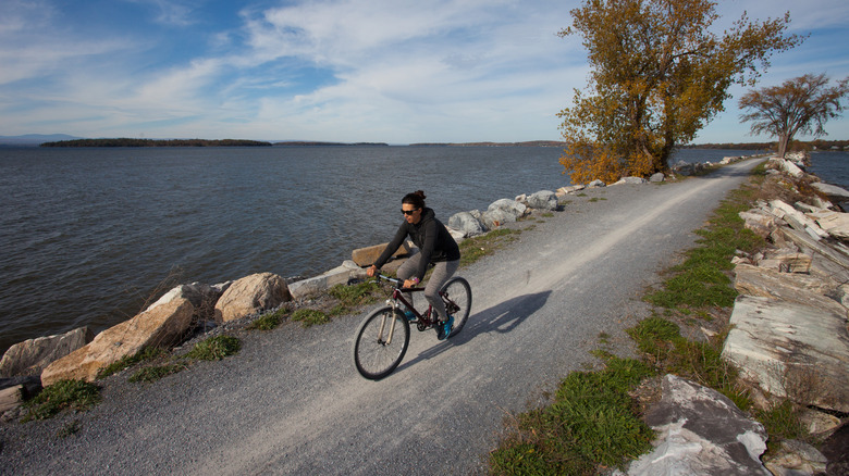 A cyclist pedals down the Island Line in Vermont