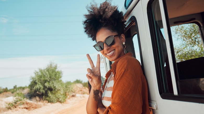 woman outside camper van