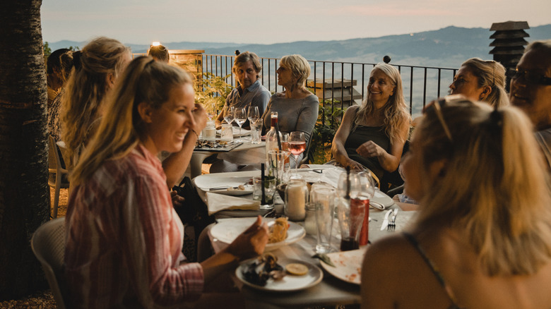 People eating dinner in Italy